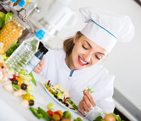 Positive woman in cook uniform — Stock Photo, Image