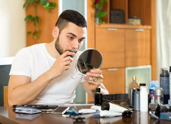 Removal of hair from nose — Stock Photo, Image