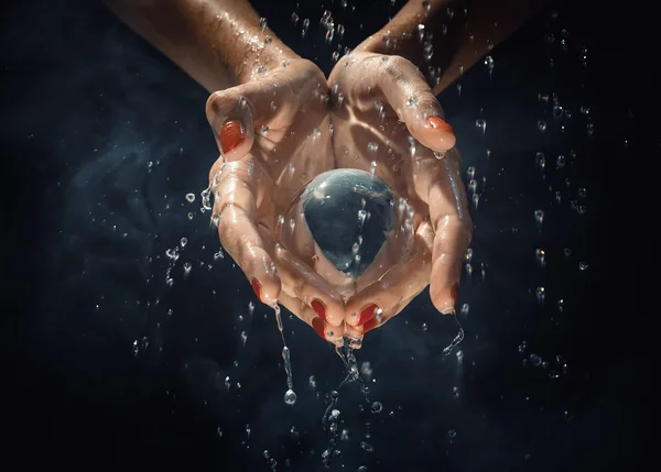 Glass world in his hands — Stock Photo, Image
