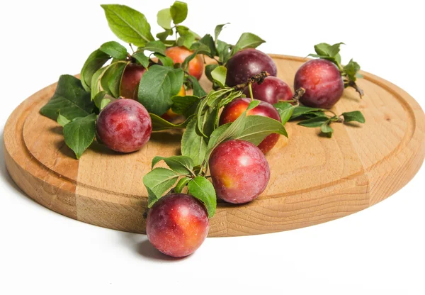 Plums on board — Stock Photo, Image