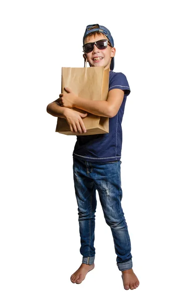 Adolescente con bolsa de papel — Foto de Stock