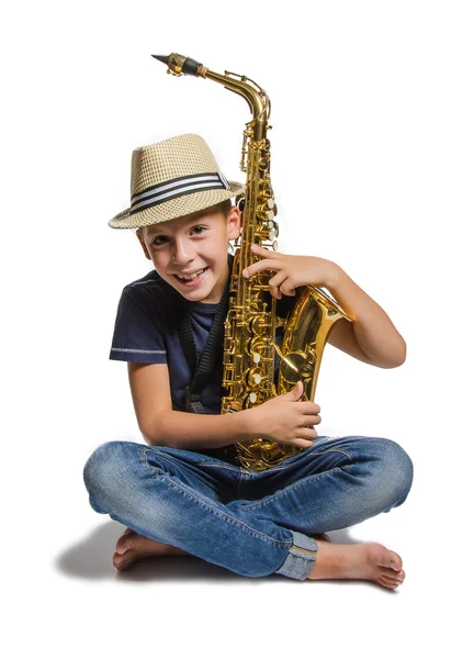 Tonåring med saxofon — Stockfoto