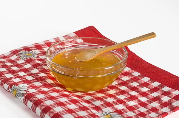 Honey in glass bowl — Stock Photo, Image