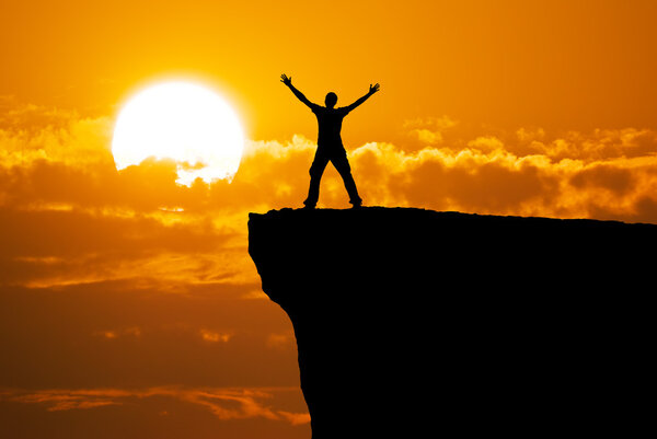 Man on the mountain edge. 