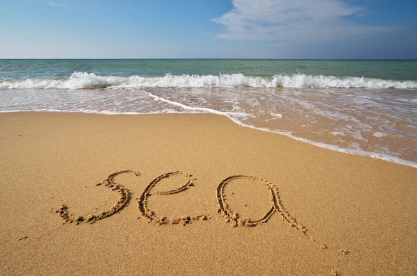 Slovo moře na pláži — Stock fotografie