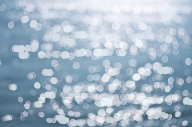Deniz yüzey yanıp sönme bokeh.