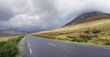 Road near the Errigal mountain clipart