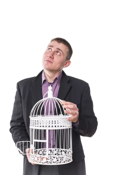 Homme avec une cage pour oiseaux — Photo