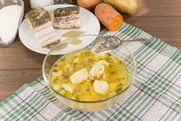 Soup with dumplings and ham — Stock Photo, Image