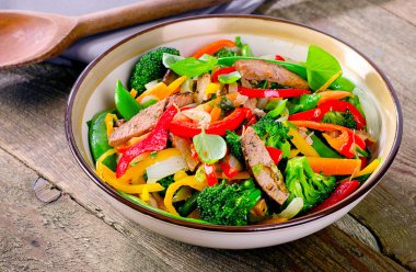 Beef stir fry with vegetables clipart