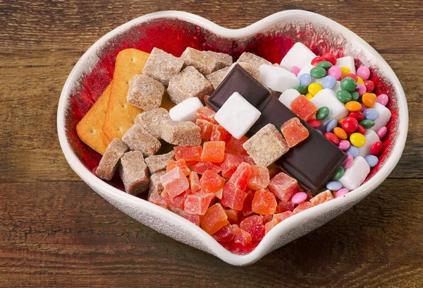Diferentes tipos de açúcar, doces e biscoitos — Fotografia de Stock