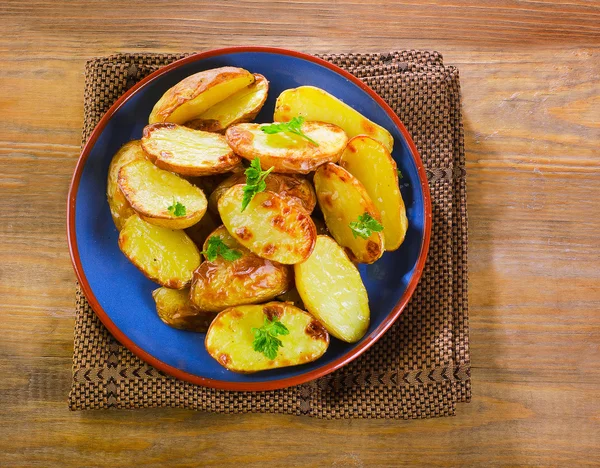 Smažené brambory s bylinkami — Stock fotografie