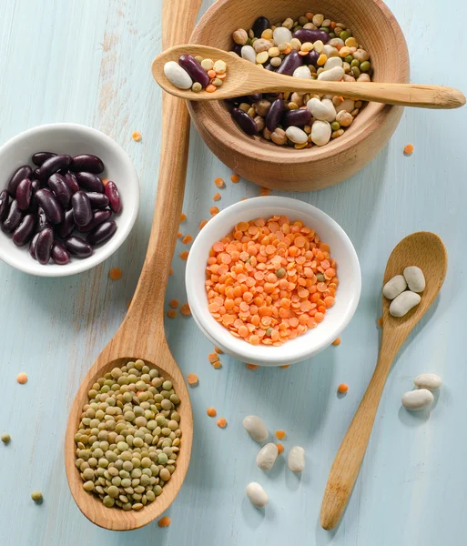 Beans and lentil on wooden table — Stock Photo, Image