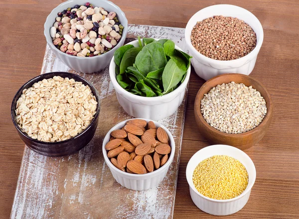 Different food in bowls Stock Photo