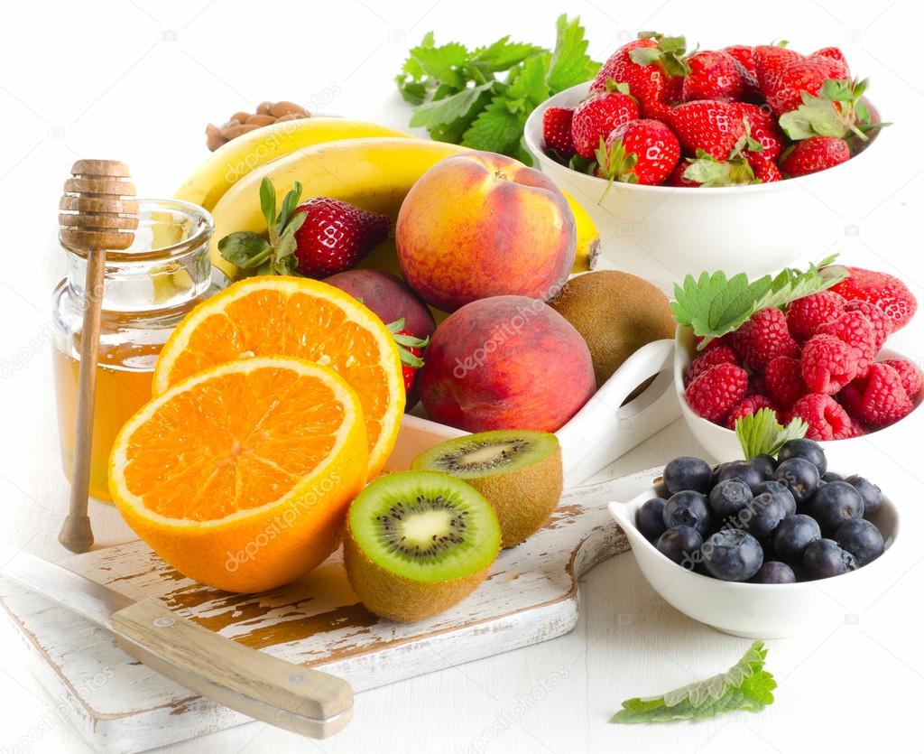 Fresh fruits and honey — Stock Photo © bit245 110767012