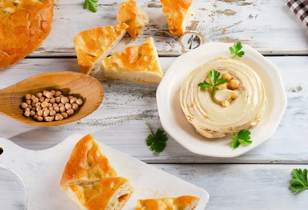 Plate of  a Creamy Hummus with pita. — Stock Photo, Image