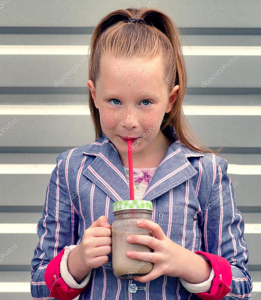 Little girl drinking milk drink Stock Photo by ©bit245 115828950