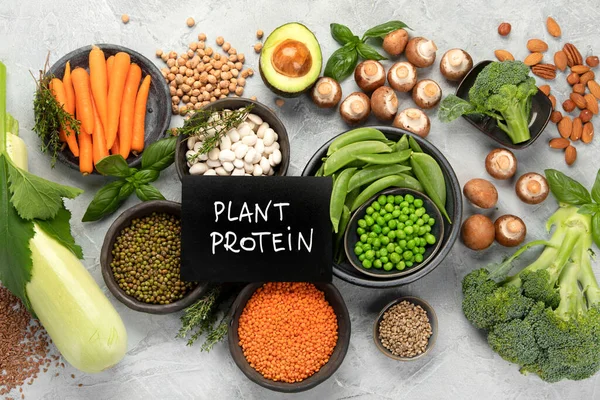 Natural sources of plant protein on light background. Healthy balanced diet concept. Top view, flat lay