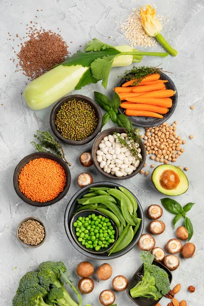 Natural sources of plant protein on light background. Healthy balanced diet concept. Top view, flat lay