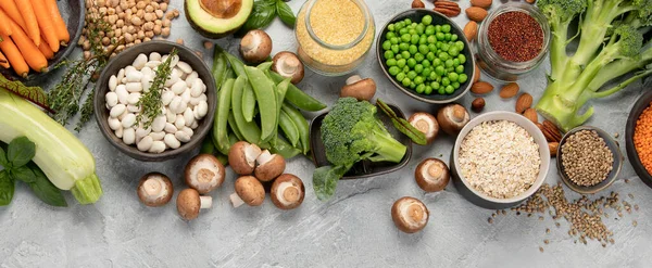 Natural sources of plant protein on light background. Healthy balanced diet concept. Top view, flat lay, copy space, panorama