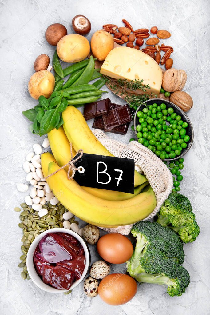 Food high in vitamin B7 on dark background. Healthy diet concept. Top view, flat lay, copy space