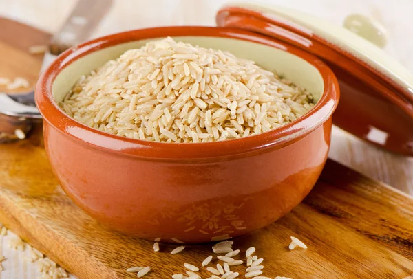 Natural brown rice in   bowl. — Stock Photo, Image