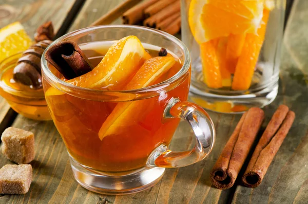 Christmas tea with orange, honey and spices — Stock Photo, Image