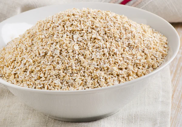 Healthy Oat bran in  white bowl — Stock Photo, Image