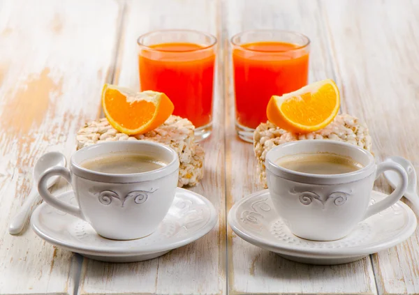 Két csésze kávé és narancslé — Stock Fotó