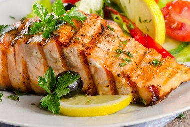 Grilled Salmon with fresh salad . clipart
