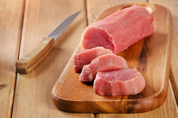 Raw beef  on  cutting board Stock Image