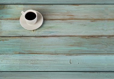 Ahşap arka planda kahve fincanı