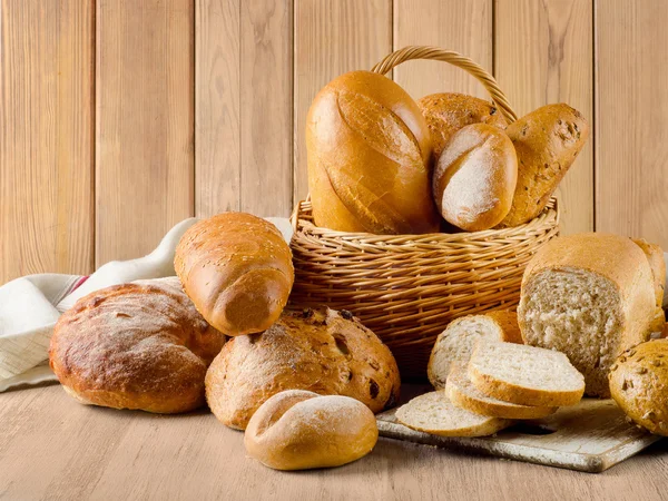 Bread loafs in basket — Stock Photo, Image