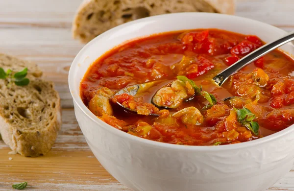 Bowl of seafood soup — Stock Photo, Image