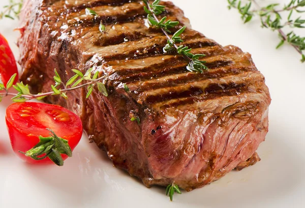 Beef steak with  herbs — Stock Photo, Image