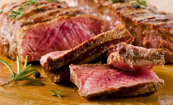 Beef steak with  herbs — Stock Photo, Image
