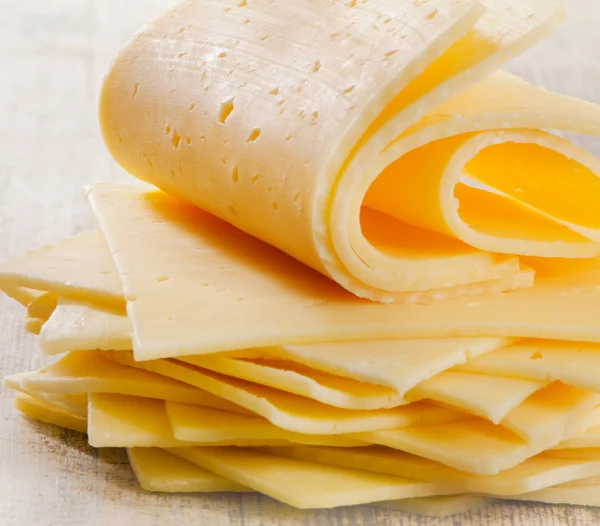 Slices of fresh cheese — Stock Photo, Image