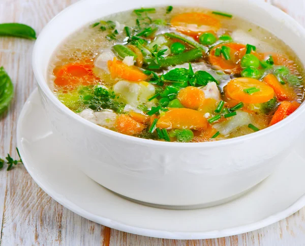 Sopa em uma mesa de madeira — Fotografia de Stock