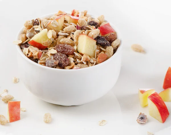 Healthy muesli and apple — Stock Photo, Image