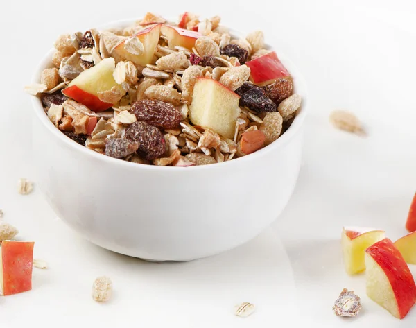 Healthy muesli and apple — Stock Photo, Image