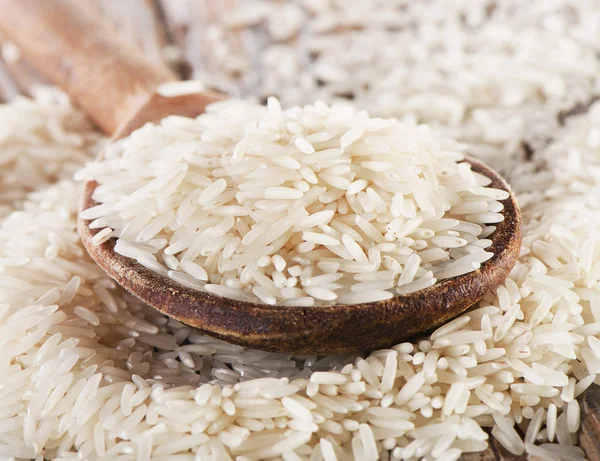 Basmati rice in spoon — Stock Photo, Image