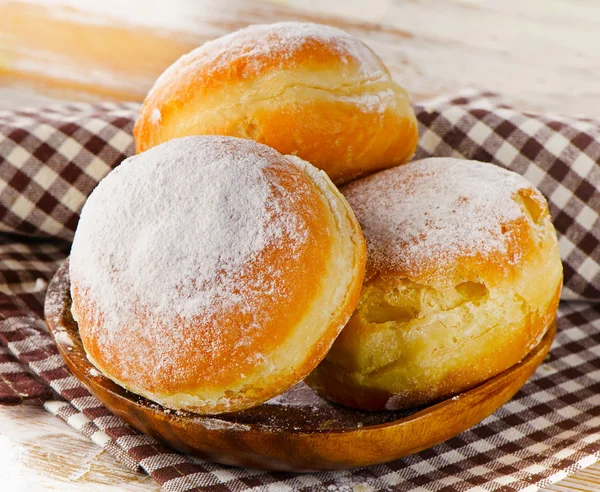 Donuts with powdered sugar — Stock Photo, Image