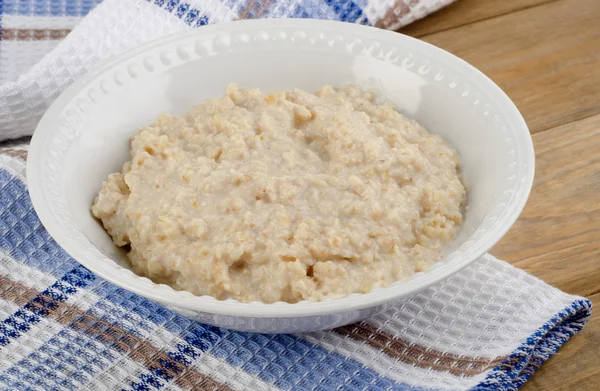 Bowl of fresh oatmeal — Stock Photo, Image