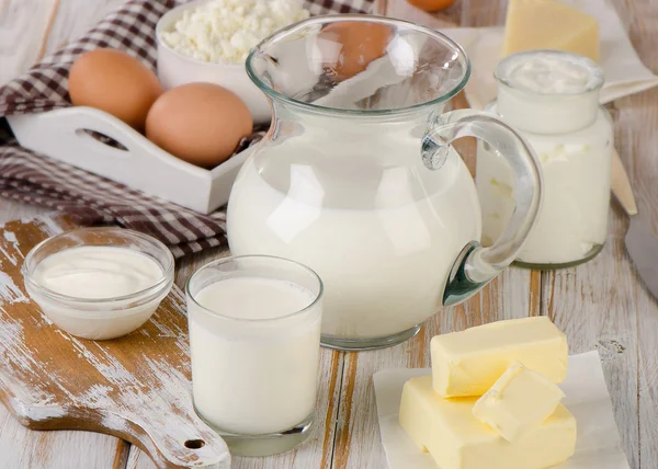 Milk products on a wooden table. — Stock Photo, Image