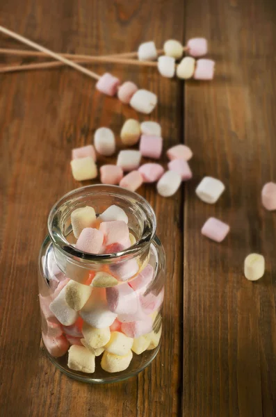Sweet marshmallows in a glass jar — Stock Photo, Image