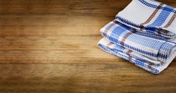 Tablecloth textile on wooden background. — Stock Photo, Image