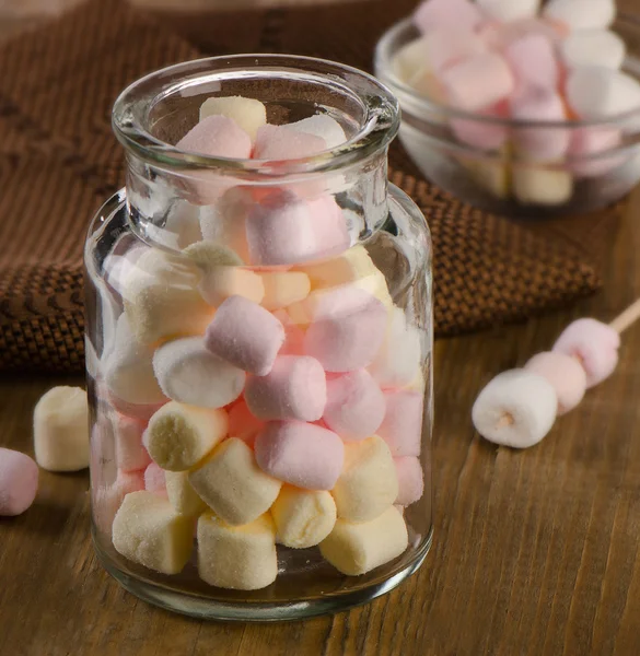 Sweet marshmallows in a glass jar — Stock Photo, Image