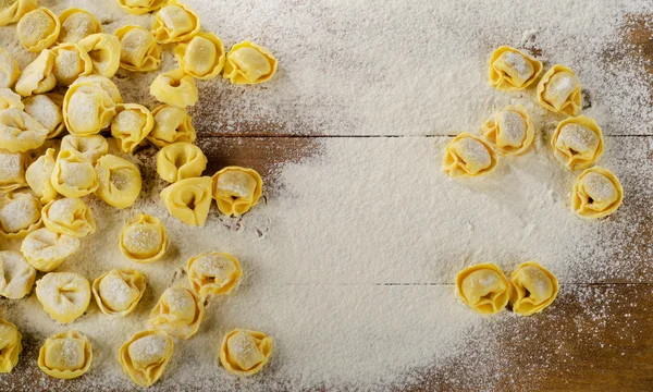 Freshly Made Ravioli on  wooden background. — Stock Photo, Image