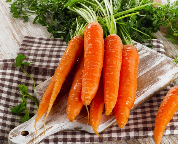 Fresh carrots with leaves — Stock Photo, Image