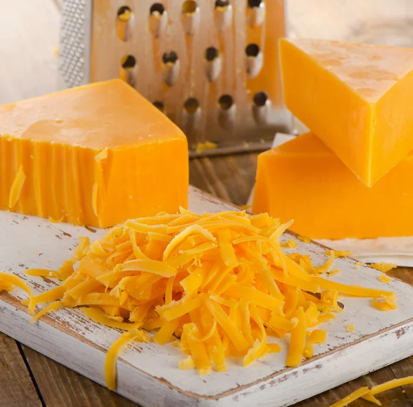 Reszelt cheddar sajt — Stock Fotó